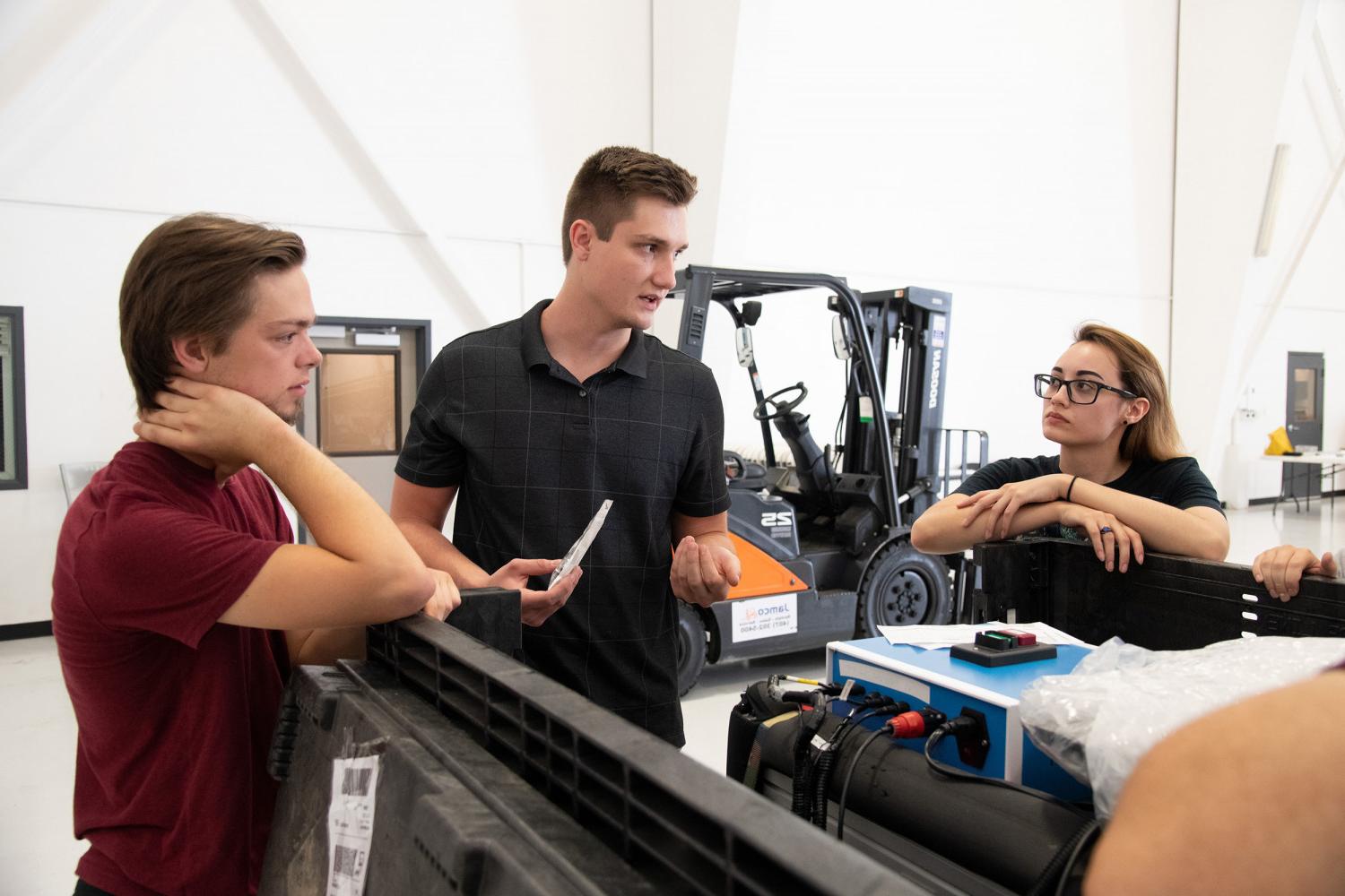 Carthage microgravity students 和ir Magneto-active Slosh Control (MaSC) experiment preparing for a Test Readiness Review prior to a ...